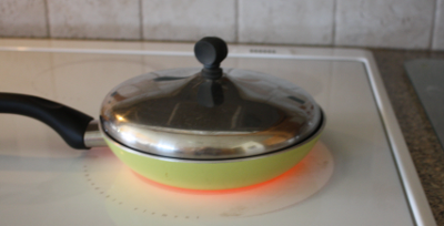 range top pan with food being heated